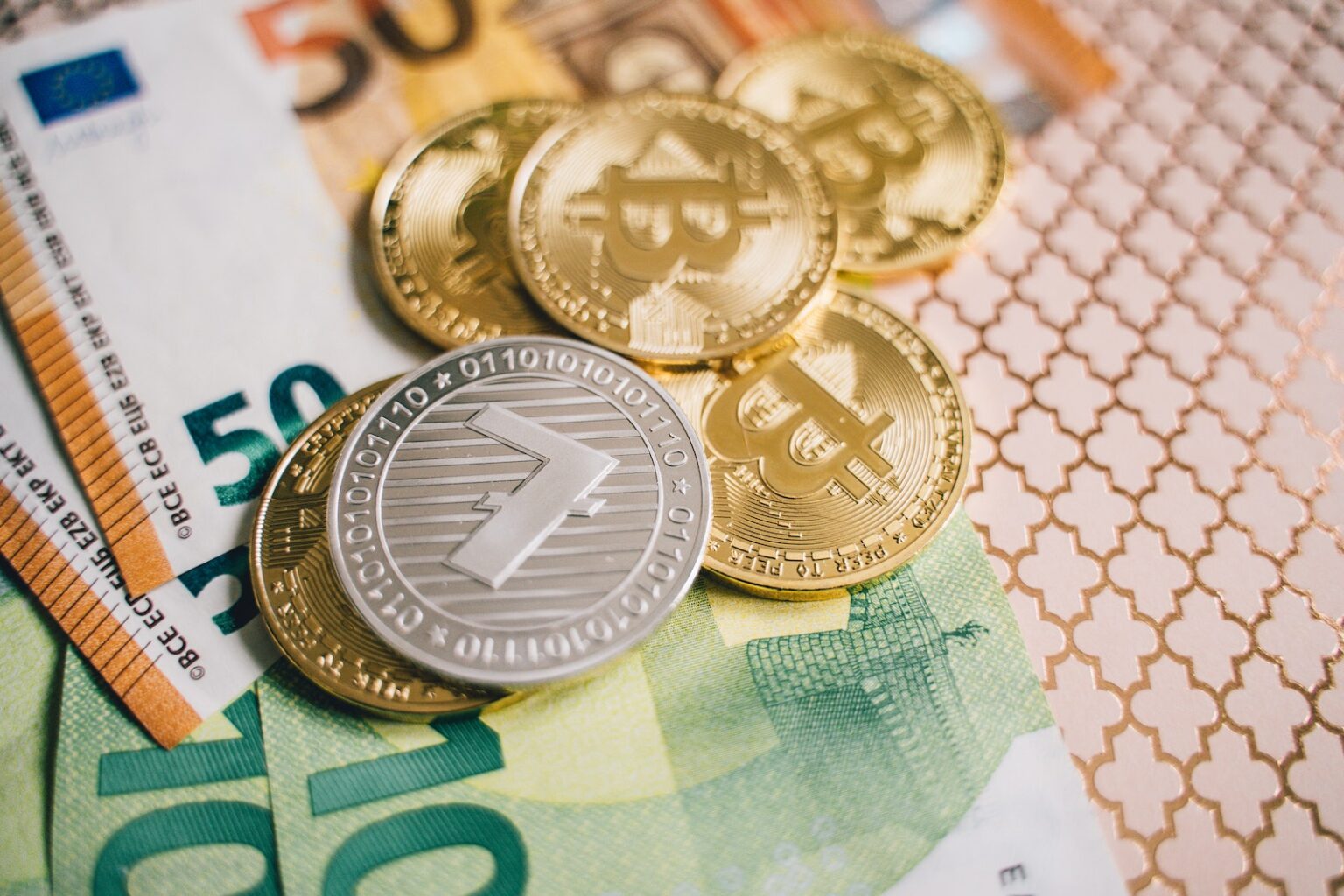 Close-Up Shot of Coins and Bills